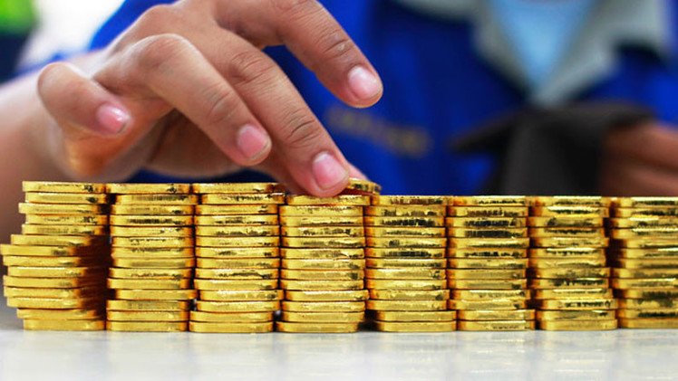 Subida del precio del oro, ¿escudo contra el dólar y euro débiles?