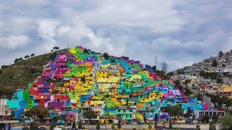 Fotos: El mayor mural de México pintado sobre las casas de un barrio erradica la violencia