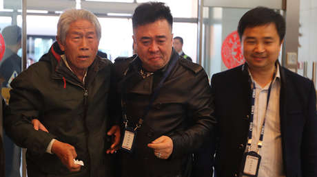 "Bienvenido a casa soldado": Veterano chino atrapado en la India regresa a su país 54 años después