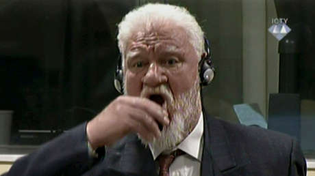 Revelan cuál fue el veneno que tomó el general croata frente a las cámaras durante su juicio