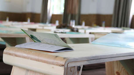 China: Maestra arrastra a una niña y la golpea violentamente contra un armario (FOTO)