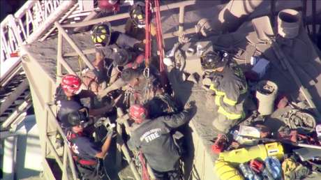 FOTOS, VIDEO: Rescatan a un hombre que pasó más de 2 horas atrapado entre cemento
