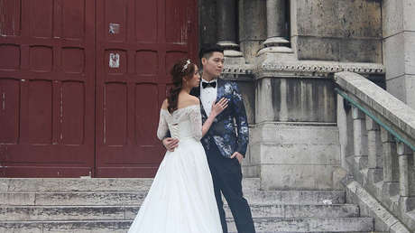 El 'show' debe continuar: No detienen una boda en China a pesar de un incendio (VIDEO)