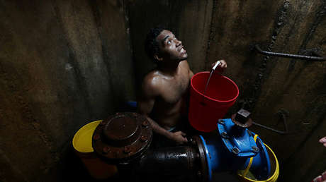 "Aquí el agua se caza": Así 'resuelven' los venezolanos la falta de suministro tras el apagón