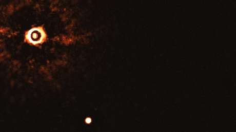 Captan por primera vez 2 exoplanetas orbitando una estrella similar al Sol (IMÁGENES)