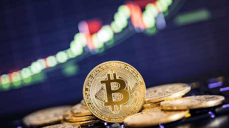 El bitcóin actualiza su precio récord al superar los 59.000 dólares