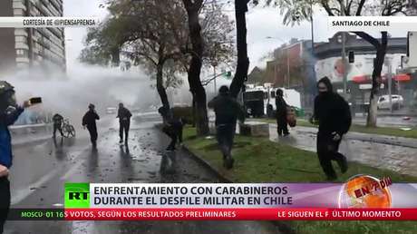 Enfrentamientos con carabineros durante el desfile militar en Chile