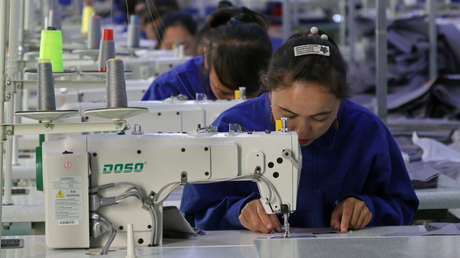 Exportadores chinos de ropa de invierno trabajan horas extras para cumplir con la alta demanda europea