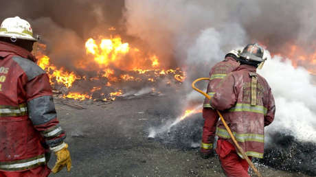 Controlan un voraz incendio en Venezuela registrado en una zona industrial de Caracas
