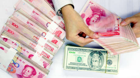Piden a bancos chinos reducir compras de dólares