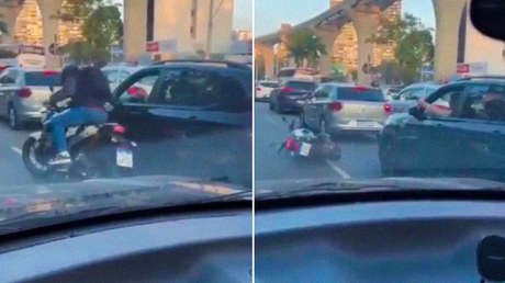 Ladrón asalta un coche a punta de pistola, pero sucede algo inesperado (VIDEO)