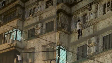 Héroe callejero rescata a un niño que pendía en el aire (VIDEO)