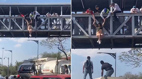 VIDEO: Ciudadanos salvan a una mujer que intentó saltar de un puente peatonal