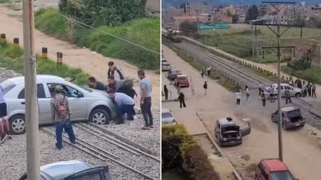 VIDEO: Un vehículo se queda atascado en una vía férrea y su ocupante sobrevive de milagro