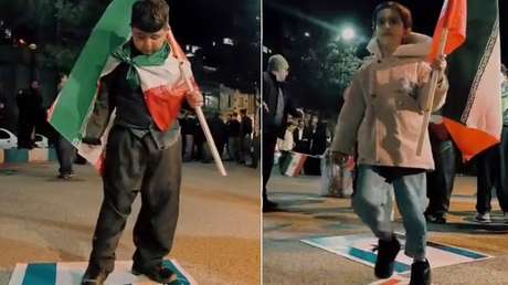 Niños iraníes pisotean banderas de EE.UU. e Israel en un acto público (VIDEO)